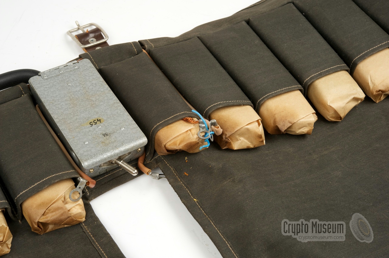 Unissued battery cells stowed in the pockets of the belt