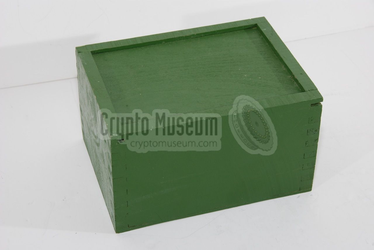 Green wooden box with hand-crank power generator