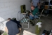 Bernd Rothe at work in his garage. In the foreground Peter Bl�hmer.